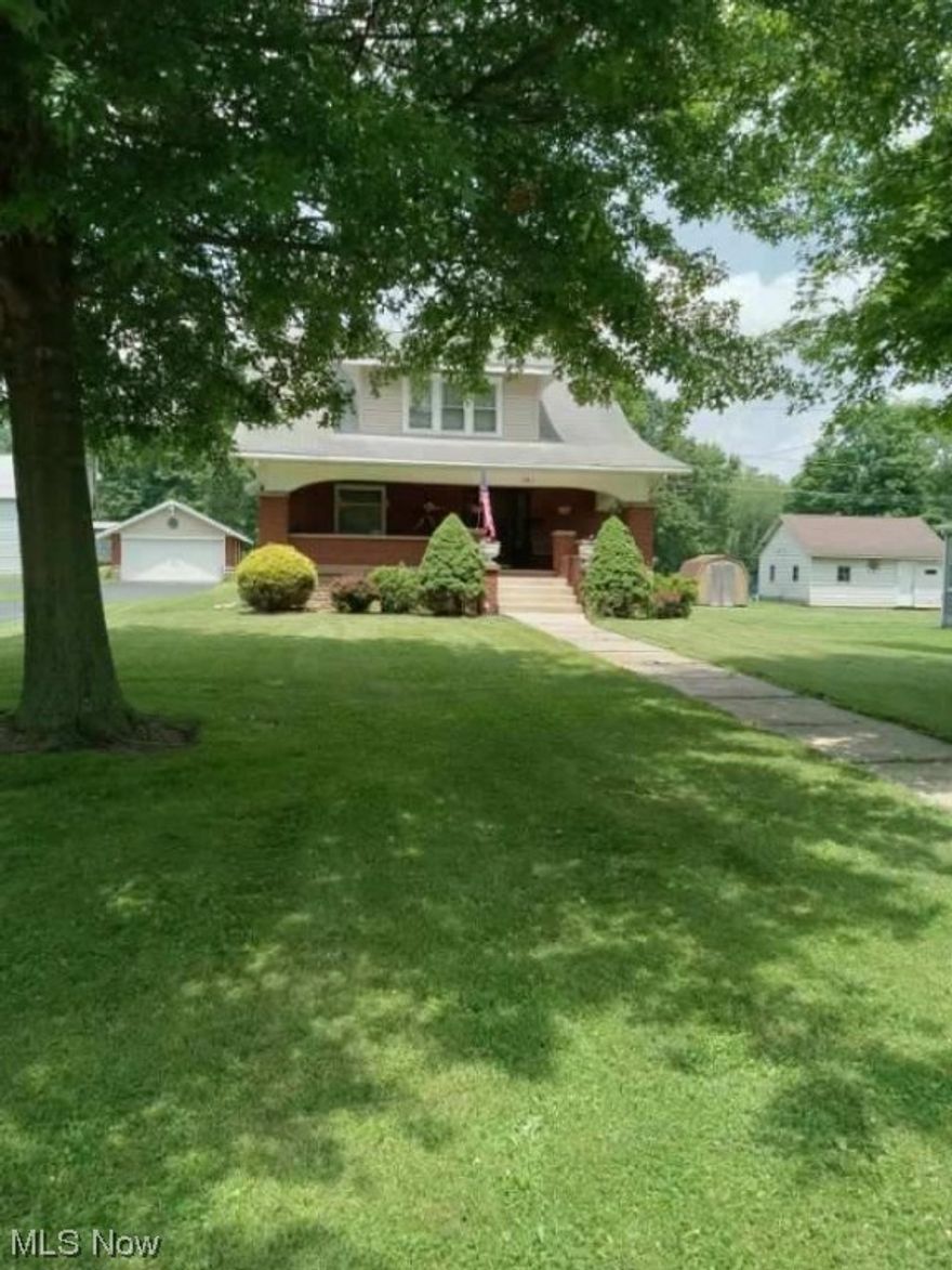 This is a great opportunity property it is being used as a store but could be used as a home.  Zoned Commercial and Residential.  Live in the home and run your business out of it.  Home features 3 bedrooms and 1.5 baths.  Large Spacious Rooms.  Beautiful woodwork throughout the home. There is a 2 car detached garage and 2 outbuildings. Paved driveway.  New air conditioner and duct work.  All of this sitting on almost 1 acre of ground in the city limits.