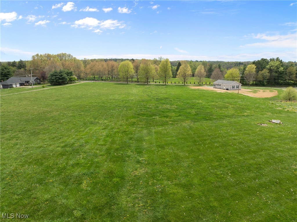Look no further, the perfect lot to build on. Perfect because all utilities are accessible. It is a nice flat area near the golf course, near town and centrally located to go to Columbus or Pittsburgh. This parcel is being surveyed to be plus/minus 1.5 acres. What more can be said about this prime lot; other than, it’s ready for you to build your dream home? Take a drive-by today.