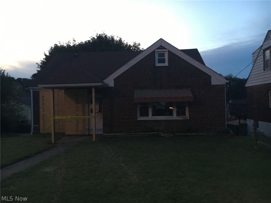 Brick cape cod home corner lot in the city of Weirton.  Detached 1 car garage in rear of home.  Main level has living room, dining room, kitchen, 2 bedrooms & full bath.  Finished bedroom on upper level.  Rec room & half bath on lower level.
