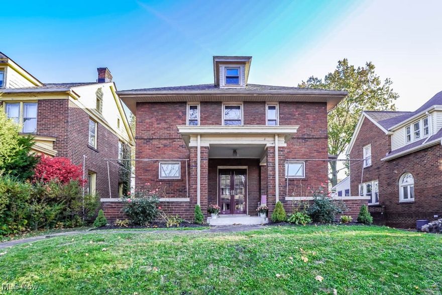 Don’t miss out on this spacious brick colonial, thoughtfully updated to maintain its original character and offering potential for four bedrooms! Recent improvements include all new windows, furnace, hot water tank, water softener, plumbing, and electrical. A welcoming front porch opens into a bright vestibule, leading through French doors into a cozy living room where the fireplace takes center stage. A pillared side entrance from the driveway adds convenience.

Perfect for gatherings, the dining room offers ample space for holiday meals, while the kitchen brings fresh appeal with brand-new GE appliances, butcher block countertops, and a farmhouse sink. A versatile room off the kitchen, with a new sliding door to the deck, can serve as a family room or main floor bedroom, with a full bath nearby for added flexibility.

Upstairs, three spacious bedrooms include a primary suite with hardwood floors and a modern full bath featuring new fixtures and beadboard paneling. The hallway offers built-in linen storage, with new carpet in the secondary bedrooms. A fully finished, insulated attic provides extra living space, ideal for an office, playroom, or fourth bedroom.

The freshly painted basement includes a laundry area with a utility sink, new lighting, and glass block windows, along with ample storage. Outside, a fully fenced backyard offers privacy and includes a shed for lawn equipment. Parking includes a shared driveway in the front and a private one car garage plus an extra parking pad in the back.

Located on a charming brick-lined street near Stadium Park and the Pro Football Hall of Fame, this home balances the warmth of a century home with modern conveniences. Call today to schedule your tour!