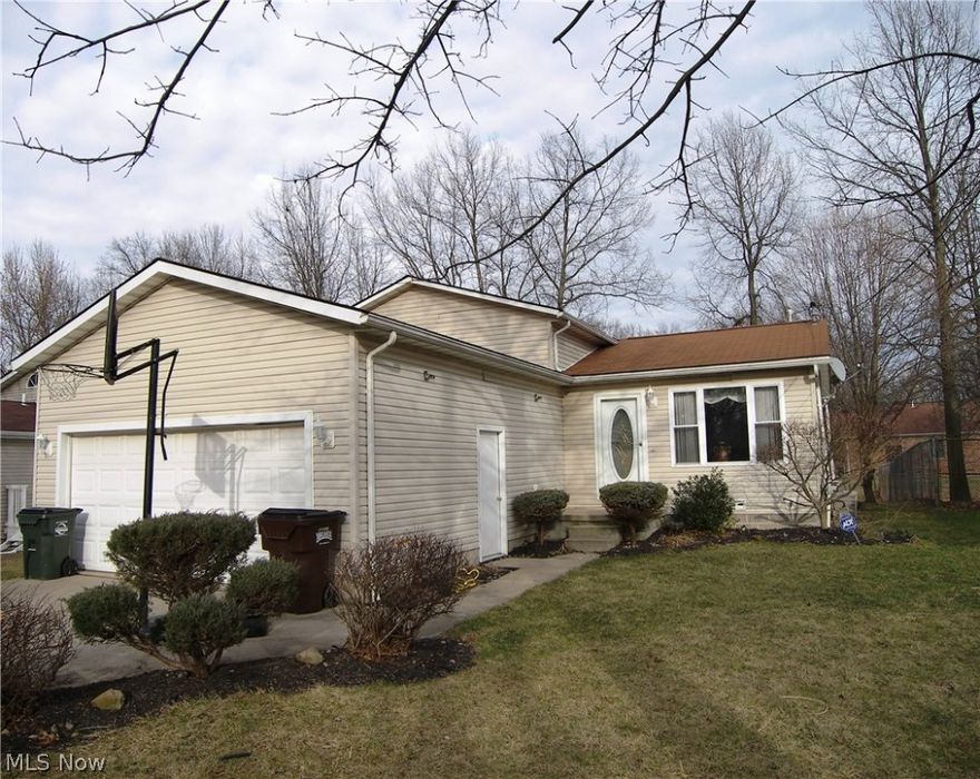 Only 14 yrs old.......3 bedroom 2 full bath split with open floor plan. Updated kitchen with ceramic floors and kitchen. Lower level family room with fireplace and full bath on that level as well. Split with Basement area.....a bonus......partially fenced in yard with deck and above ground pool. Attached 2 car garage...central ir and more. Located within Clearview school district. Call for your appt today!