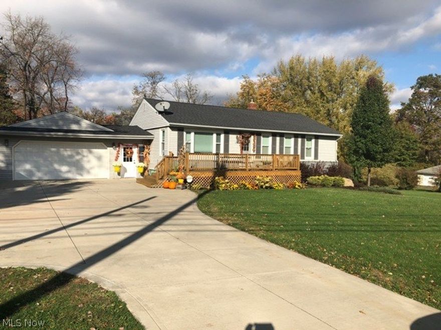 Beautiful, well maintained 4bedroom, 2full bath ranch situated on over an acre.  In addition to the completely updated kitchen, bathrooms, flooring, lighting & driveway, owners added a new water softener system with new filter, central air, security system & updated mudroom with insulation and heat.  All stainless steel kitchen appliances stay. Lower level has a 4th bedroom, living area,Full bathroom and walk out to the huge back yard. The outdoor living space offers a 24x8 deck and enclosed patio.  New Roof, Furnace, Hot water tank & windows in 2013. Don't miss your opportunity to own this turn key home!