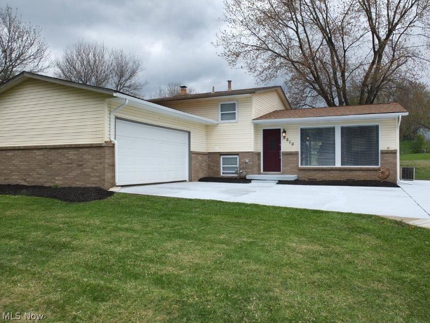 Wow! Over 1,400 square foot, 4 bedroom, 1.5 baths 3 level split in Perry! This home has been completely remodeled from top to bottom.  Large open living room with picture window and family room with fireplace.  Updated kitchen with new cabinets, tile backsplash, stainless steel oven/range and dishwasher, and breakfast bar.  Kitchen open to dining area and living room.  Bedrooms on upper level with full bath that has been remodeled with new vanity and tile floor.  Huge family room in lower level with fireplace.  Additional bedroom in lower level and fully updated half bath.  Large deck overlooks great backyard.  2 car attached garage also.  Don't miss out on this beautifully updated home!