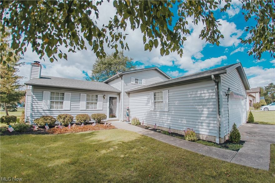 Welcome to this Charming 3 Bedroom, 1.5 Bath Split Level in the desired Avon Community.   The front door opens to the Living Room with a beautiful Stone Gas Fireplace with Octagon Windows on both sides, and Vaulted Ceilings throughout the first floor. Through the Living Room, you’ll find the Dining Area and Kitchen with plenty of Cabinetry, a Pantry, Black and Stainless Appliances and White Corian countertops.
Upstairs are all 3 bedrooms, and a Renovated Full Bathroom with White Tile Floors, White Countertop, and White Tiled Bath/Shower Combo.  The lower level features a Family Room, an updated Half Bath, a large Storage Area and Laundry Room, where washer and dryer stay as well.
The spacious Backyard can be accessed from the Dining Room and is the perfect place to relax or entertain on the Patio.  Other features include the attached 2 Car Garage, Storage Shed and a newer HVAC System.