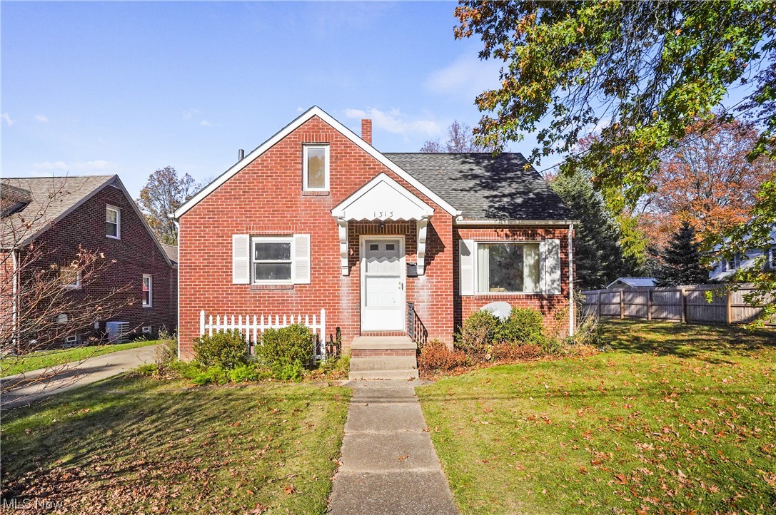 Welcome to this updated all brick home! The home has been freshly painted and there is new flooring throughout. All on the first floor you will find the living room, eat in kitchen, two bedrooms and a full updated bathroom. The bright eat in kitchen has new cabinets, countertops, and has two windows to let the natural light to shine through. Upstairs you have another bedroom with built in drawers. There is an unfinished basement offering a laundry area. New furnace, the home is wired and ready for A/C. Large backyard with plenty of room to entertain and two car detached garage. Move in ready!