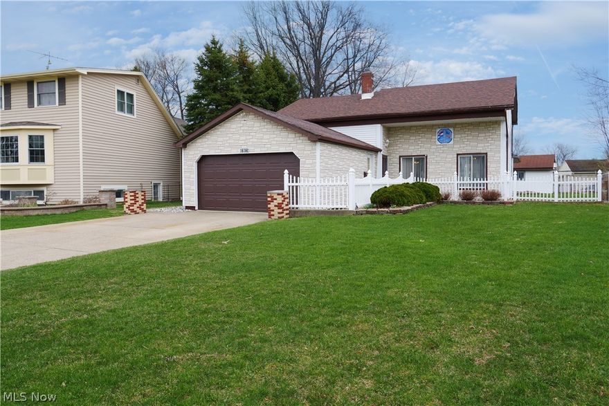Welcome to 36360 Sunset Dr! This oversized split-level home sits comfortably on a large lot on a quiet dead-end street. As you pull up to the property, you’ll notice the oversized driveway, enhanced by brick pillars, along with its vinyl, brick-look exterior. A welcoming vinyl fence surrounds the walkway and front porch area.
The roof is only four years old—a major upgrade—along with an extension off the back of the home and a massive covered, screened-in patio. The furnace is also about four years old, and the water tank was replaced in September.
Upon entering, you’re greeted by updated flooring that leads into the family room and kitchen. The kitchen features granite countertops, a sit-up bar, and a dining area, creating an open-concept layout perfect for entertaining. Flowing from there is a huge bonus room in the extended portion of the home, overlooking the yard, with sliding glass doors that lead to the back patio.
The lower level offers an additional rec room with patio access, as well as a large laundry room that includes what is essentially a second kitchen—complete with an electric stove, refrigerator, cabinets, and sink. All appliances stay, so no worries there.
The second floor features two spacious bedrooms and a full bath with tile and a newer quartz vanity countertop. The third floor includes two more large bedrooms and a second full bath, making this home ideal for a large family or hosting guests. All upper levels feature real hardwood flooring.
Step outside to your backyard oasis, which includes a concrete walkway leading to a large outbuilding—perfect for a man cave or outdoor entertaining. The outbuilding also offers a storage barn. You’ll also find a custom-built pizza oven and smokehouse. Nearby is a custom concrete table, ideal for gatherings and pizza nights. A fenced-in garden awaits, perfect for growing your own fresh toppings. This charming property is full of character you won’t find anywhere else and offers plenty of space.