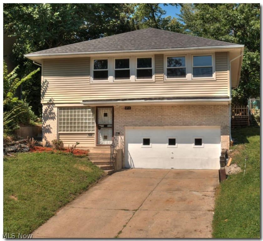 Beautiful Bi-level 4 Bedrooms, 2 Full bath in Prime Location with Many Updates and Features! Beautiful Harwood & Ann Arbor Oak Laminate Flooring. The Main Floor Offers Open Floor Plan with a Large living room, Dining area and Kitchen with stainless steal appliances . 3 Bedrooms and a full Bath. The Entree Level Offers a Large Family/TV Room and a Potential in-law Suite with it's own Bedroom and Full Bath. 2 Car Attached Garage. Enjoy the private backyard that is perfect for entertaining. Close to shopping and easy commute to downtown Cleveland and major hospitals.