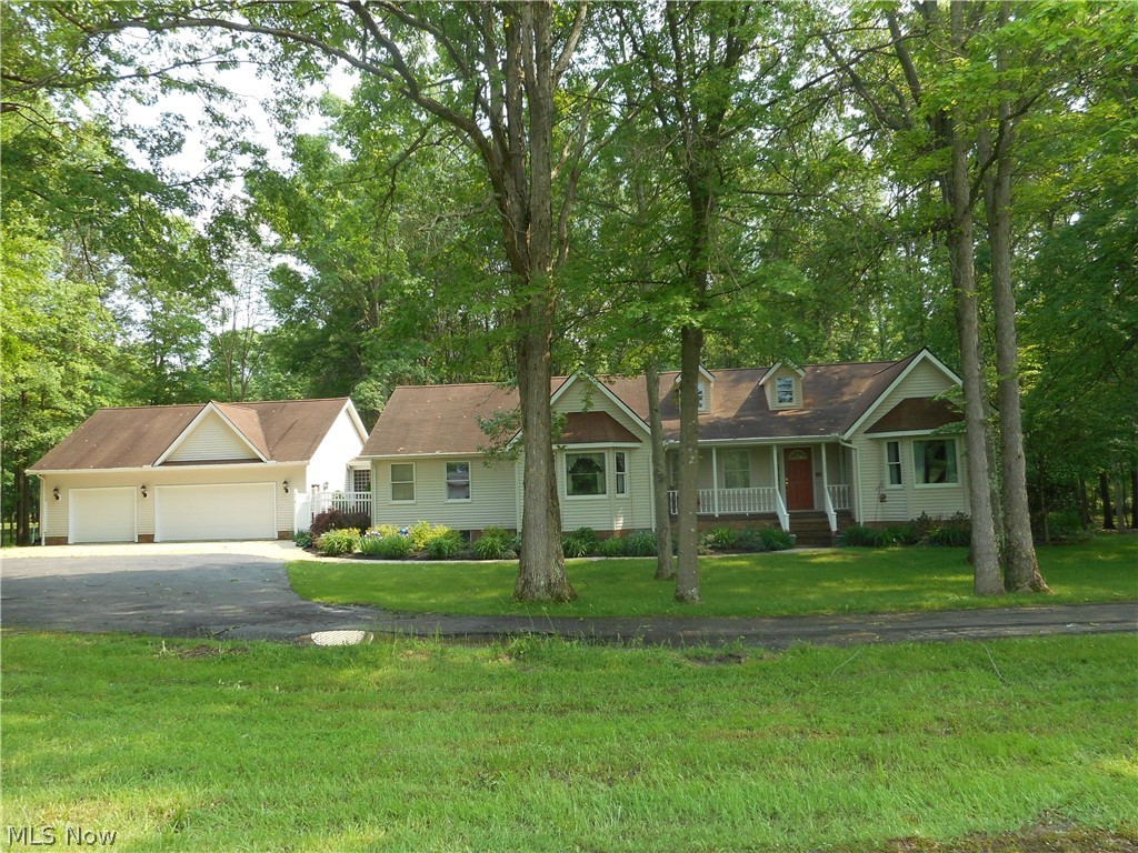 Enjoy peace and tranquility in this lovely 3 bedroom ranch situated in a beautiful 5 acre country setting. The vaulted Great Room offers recessed lighting, wood burning fireplace and features two sets of french doors that leads to the four season vaulted sunroom with two skylights that brings the natural lighting indoors or to the spacious deck. In addition, the sunroom features french doors to the deck so this would be the perfect home for entertaining this summer. Screened in porch is 10 x 30 and offers exceptional space to enjoy the morning with your cup of java while overlooking the pond and catching a glimpse of some passing deer and other wildlife. Spacious and open kitchen offers plenty of cabinet and counter space with stainless steel appliances, pantry & large eating area and is open to the dining room/great room. The master bedroom is ensuite with jacuzzi, walk-in closet and walk-in shower. The other two bedrooms are good size with nice closet space. The convenience fir