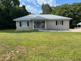 Private 5+acre lot with a 3 bedroom, 3 full bath brick ranch home. Finished rec room & full bath in lower level. Master bedroom with master bathroom. Sun room off living room. Garages - 1) 2 car basement 26 x 22 2)Detached 20 x 20 garage with attached covered patio 20 x 20 3) 30 x 50 garage with concrete & electric. Property is surrounded by woods & has level rear lot. Well water has ultra violet filtration system. Home has been extensively remodeled over the past couple of years. Plenty of places to relax - Covered front porch, covered patio off garage or the sunroom.
