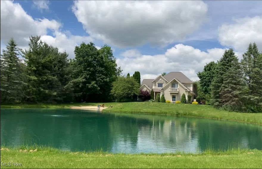 New Geothermal heat and air in August 2024 and new backup sump pump in January. All newer appliances.
Enjoy the view of the beautiful stocked lake from the second owner suite located up stairs. First floor owner suite with bath and walk in closet. Loft overlooks the great room and there are three bedrooms and bath on second floor.
Kitchen has beautiful maple cabinets and lots of storage space. Enjoy the cozy fireplace in eating area  while cooking in kitchen.
Half bath on first floor.
Large finished area in the basement for a great game room.
Oversized back deck with a view of the 3.74 acres. Storage shed in back.
Three car garage is extra large.