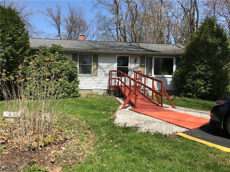 Cute 3 BR ranch situated on approx. 1.7 Acre lot located on Lake Erie.  This is a lovely property and would make a great year round Lake property or summer home.  There is a large living room, large eat-in kitchen plus 3 Bedrooms and one full bath.  There is also a large 3 season room off the kitchen facing the lake.  There are 2 large storage sheds in the back of the property and one at the front of the property.  Nice blacktop driveway plus a wheel chair ramp on the front.  There is a full basement that has been partially finished into a family room.  Laundry is located in the basement.  Circuit breakers.