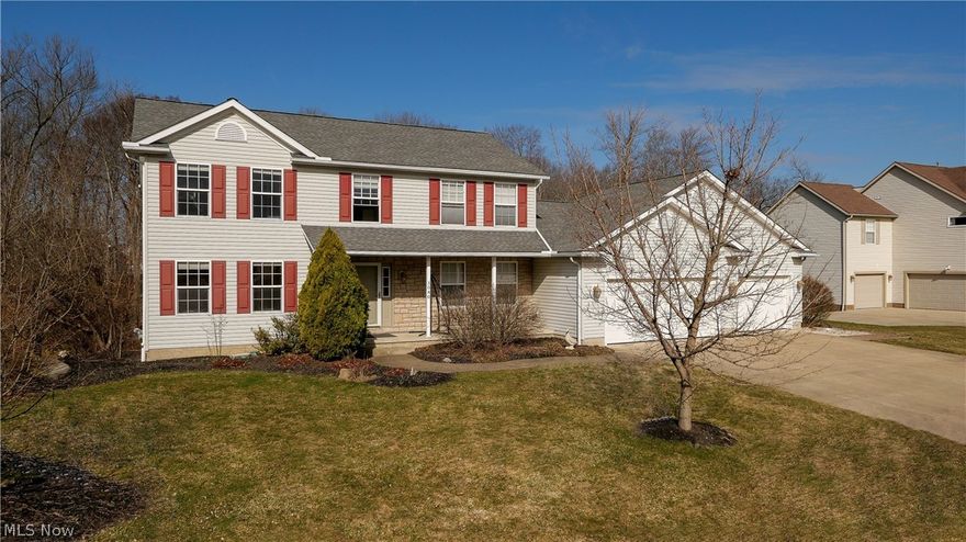 There’s so much to love in this stately, 4 Bedroom, 3.5 Bath Colonial on one acre in Timber Creek! Glorious and private, backyard setting with panoramic views of wooded lot and pond. Amazing, walk-out Lower Level with complete Kitchen, Full Bath, two large Family Room/Rec Room areas, Workshop area, and storage galore. PLUS, all the desirable design features and quality craftsmanship of Camden Builders! Formal Living Room’s French doors offer option for intimacy and, when fully open, provide easy flow throughout main level… perfect for large gatherings. Welcoming, natural light-filled Kitchen includes granite center island with breakfast bar, granite countertops and granite sink, tumbled tile backsplash, lighted pantry, and Morning Room/dining area that leads out to deck. This beautiful home makes entertaining a breeze! Newer Bella ceramic tile from Italy in Kitchen, Morning Room, and convenient, first-floor Laundry (2016). Spacious, first-floor Home Office is complete with desk and bui