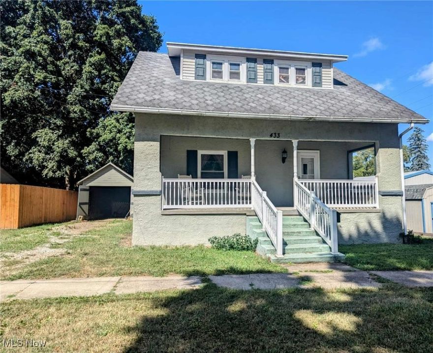 Welcome home to this charming 3-bedroom, 1.5 bath home that blends comfort and convenience. Step onto the large front porch, perfect for relaxing evenings or enjoy the rear deck that overlooks the back yard.  Inside you'll find a room living room, separate dining room ideal for gatherings, and a fully equipped kitchen with oak cabinets and plenty of storage. The property sits on a lot 
with back alley access that provides potential for more garage space in the future or a perfect garden area. Schedule a showing today and make it yours!