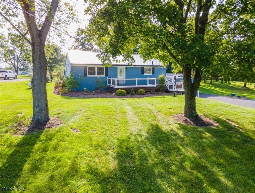 Introducing your dream ranch home! This fully updated gem boasts 3 bedrooms, 2 baths, and a spacious family room flooded with natural light. The kitchen is a showstopper, featuring trendy light fixtures, modern appliances, laminate flooring, and updated cabinets. On the main level, you'll find 3 generously sized bedrooms and a beautifully updated full bath. The lower level offers potential to be finished, a second full bath with a utility sink, and convenient laundry facilities. Parking is a breeze with an oversized 1-car attached garage and large turn-around area. Step outside to the wrap-around deck, perfect for entertaining and offering stunning views. Built in 2019, it's a prime spot for enjoying the outdoors. Recent updates include landscaping (2019), furnace (2019), water softener (2019), garage door (2019), doors (2019), widened and redone driveway (2019), new ceiling in the root cellar (2020), utility sink (2020), a new septic system in (2019), and a metal roof with gutters and gutter guard (2021). This home is a must-see.. don't let it slip away!