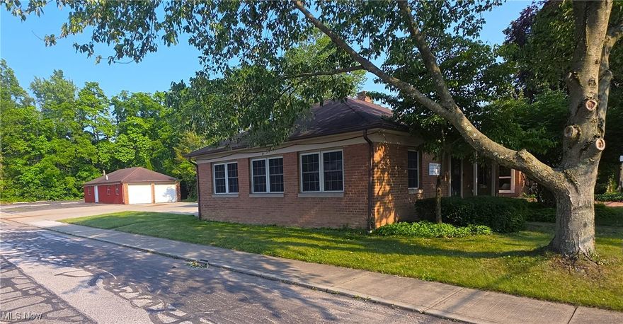 Located in the heart of Berea, this 1,500+ sq. ft. single-story brick commercial building sits on a 177 ft. deep corner lot, offering dual frontage and excellent visibility. Nestled in a residential neighborhood near Baldwin Wallace University, it benefits from a built-in customer base and steady foot traffic. Interior features include a welcoming reception area, five private offices with windows, a large multi-purpose room offering flexible use of space, two bathrooms, and a mechanical/utility room with storage. A detached 2-car garage with workshop/storage space adds versatility. On-site parking available. An affordable entry into commercial ownership—ideal for startups, professional services, or investors. Low overhead and taxes make it a smart choice for small business owners. Please see the attached zoning information.