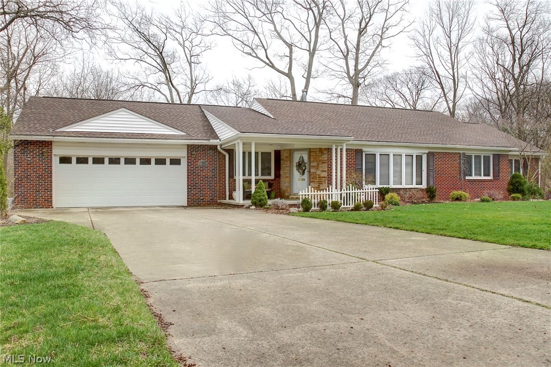 Looking for a charming, unique brick ranch on a large 1/2 acre lot in a great peaceful location? Look no further: this just may be your new "home sweet home". Located in one of Bay Village's most desirable neighborhoods bordering Porter Creek and Huntington Reserve, Wayside Lane is a tucked away hidden treasure of only 7 homes on a private cul-de-sac. 3 bedrooms, 2-1/2 baths. Cozy Family Room with gas fireplace, vaulted ceiling and built-ins adjoins the kitchen and overlooks nature's beauty. You'll love the large bright laundry rm with plenty of storage space which adjoins the oversized 27' x 26' 2-car Garage with pull-down stairs and huge attic storage area. Spacious Living Rm and Dining Rm are perfect for entertaining family and friends. Take short walks to Huntington Beach Park & Lake Erie, Cahoon Park, Bay Arts and Bay Village High School. Short drive to I-90 and conveniently located near shopping and restaurants at Crocker Park. It's all about location, location, location. This i