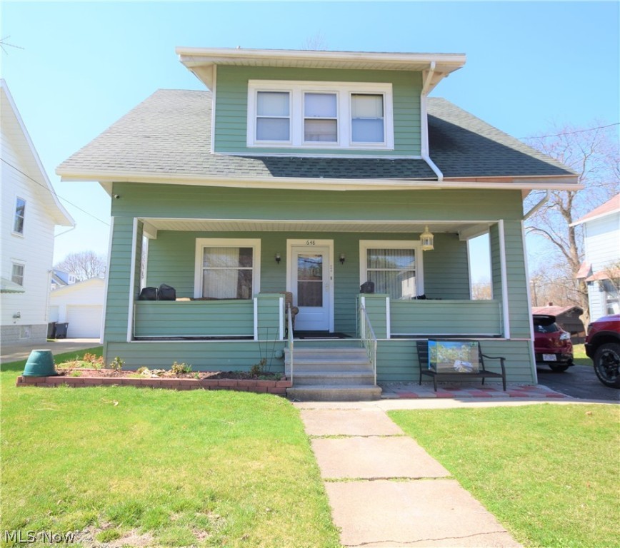 Welcome to 648 Lucille Avenue, a 3-bedroom, 2-bathroom Colonial home in Akron! This home has countless features both inside and out. The exterior has a large, covered front porch, an above-ground pool and pool deck, a car port that leads to the garage, a covered wooden deck by the pool with a built-in bench. Step inside to see beautiful cherry wood flooring throughout the spacious living and dining rooms. The living room also has a brick fireplace. The eat-in kitchen has lots of counter space and backyard access. The second level has three bedrooms, a bathroom, and a loft area with tons of built-in storage. Each room has ample storage/closet space. Laundry hookup located in the basement, as well as a second bathroom and a huge area that is currently being utilized as a fourth bedroom. This home is conveniently located near numerous shops and restaurants, The University of Akron, and Route 8. Don’t miss your chance to own this lovely home! Call and schedule a private showing today!