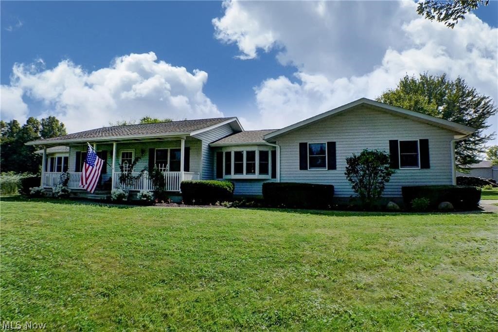 Quality construction, expert care, Space between you and your neighbors! You will be welcomed by the covered, concrete, front porch with vinyl railings. The living room opens to the den featuring a brick hearth. That room opens to the AMAZING, 4 season sunroom which overlooks the acreage (goes back to the tree line). There are 3 bedrooms including a master with a walk in closet. The eat-in kitchen features custom made Oak Cabinetry, drawers with pull out shelving, island with 5 burner, gas cook top, ceramic tile flooring and backsplash, and the mixer cabinet for the baker in the house. The Sheoga Oak flooring through most of the first floor is rugged and looks great! Two furnaces: one woodburning (used most) one propane. In addition, the 4 season sunroom (2010) and the family room feature wood burning stoves. Downstairs is a second full kitchen, a workshop/storage, a work out room and a nice, full bathroom and unfinished spaces for more storage (waterproofed 2016). Outside, you'll​​‌​​​​‌​‌​​​‌‌​​​‌‌‌​​‌​​‌‌​​​​ find