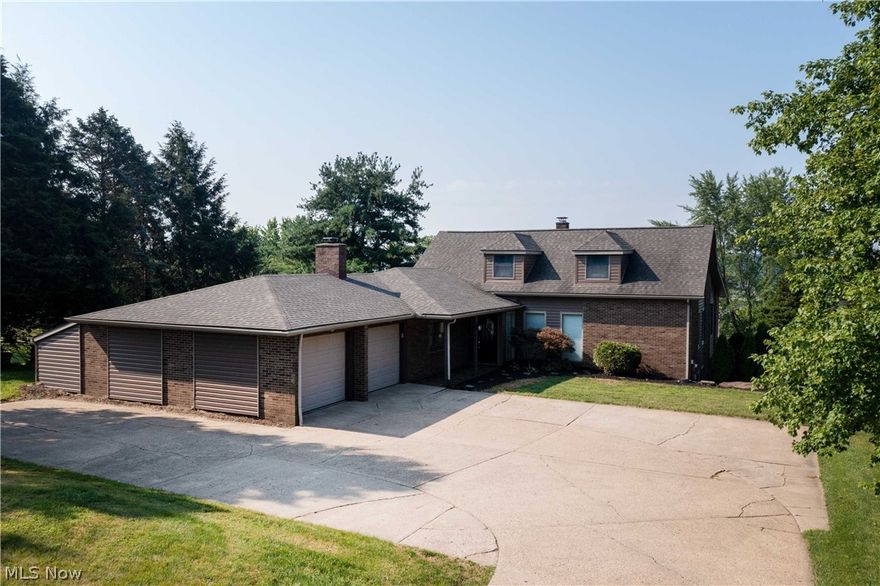 This fabulous and updated Tuscarawas Valley home offers 4,200 sq ft of beauty, entertaining, and relaxing living w fantastic views. You will love all this home has to offer; the inviting foyer leads to the great room with a beautiful custom Marble fireplace. The completely updated eat-in Kitchen features custom cherry Schrock cabinets, blue pearl granite countertop, stainless appliances, a huge center island, and a dining area w access to the large deck to admire all the beauty around. Views while relaxing/entertaining on large deck/concrete stamped patio/Inground pool or the front view of pastured fields. 1rst floor master suite w a fabulous master bath w a walk-in shower (granite surround), double sinks, walk-in closet (5x15), large 16X13 area that could easily house exercise equipment, plus your private access to the deck to enjoy a morning coffee. 1st floor also Includes a 2nd Bedroom & Full Bath. 2nd level has an open loft w/skylight, full Bath & 3rd Bedroom. Finished walk-out lower level includes a rec room that walks out onto patio w/Pool access, family room w/wood burning stove, 4th bedroom, full Bath. Laundry rm. Oversized 2-Car Attached Garage. Updates include 2015 roof, windows, vinyl siding, Trex decking, stamped concrete patio including around pool, all flooring, all Interior neutral Paint, Kitchen, all bathrooms, all trim/woodwork though out, garage door opener/door. What A Unique Home w a rural feeling but yet minutes Away from Shopping/Dining! Don’t miss out!