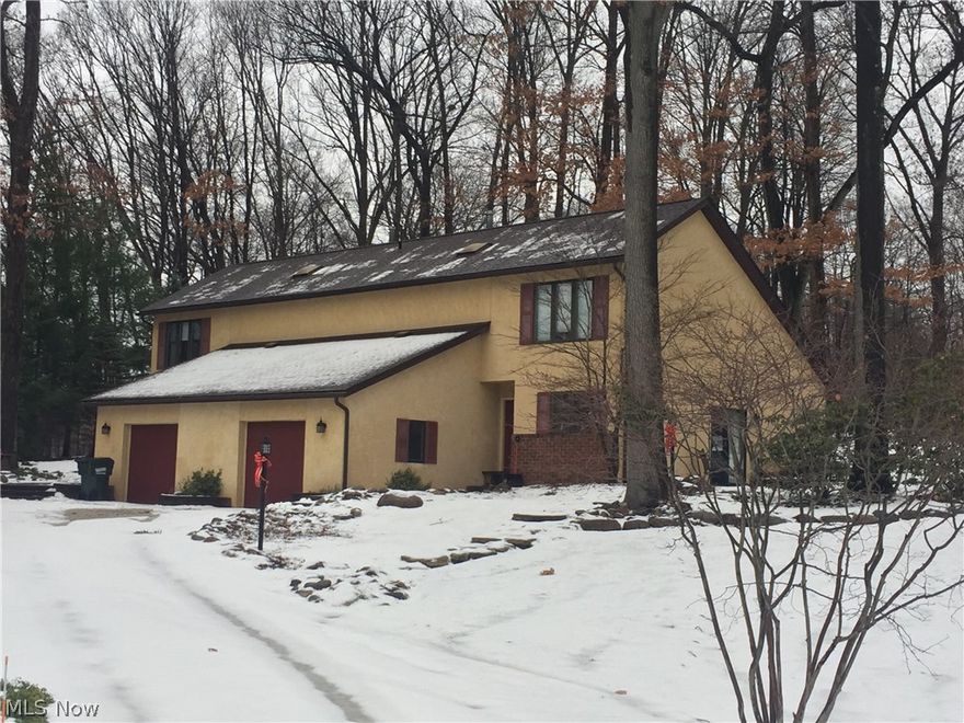 First time offered - owner occupied and never rented. Stow/Munroe Falls Schools. Custom 2 family home built in a stunning southwestern style and the finest materials - no attention to detail was spared. Nestled on 1 park-like acre off N. River Rd. in Stow, but still with city water/sewer! Close to parks, bike/hike trails, shopping, downtown Kent and more! Fall in love with the stucco exterior that has been meticulously maintained, enter via the gorgeous stone walkways and enjoy cookouts on the private brick patios. Wonderful interior floor plan features vaulted ceilings, rich carpeting, tiled kitchen and bathrooms, wood burning fireplaces, open concept kitchen/dining, and enormous master suites. The spacious units are almost 1500 SF each, with high ceilings, skylights, 2 bedrooms, including a master suite with 15x9 walk-in closet, could even be used as an office. 1st floor laundry room! Each side offers an attached garage complete with drain, water, opener and extra storage. Newer roof