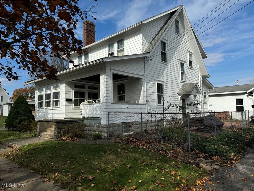 Check out this home! Character, charm, natural woodwork, built-ins, French doors, hardwood floors under linoleum, bonus area off living room, eat-in kitchen, first floor half bath & laundry.  Shingle siding was painted in 2024,  roof and furnace, 2005, water heater, 2015, and storm windows, 2000.  Outside find a front porch, patio, fenced yard, 1 car detached garage with vinyl door & 2 car carport.  The dry basement has numerous storage shelves and pegboard.  The owner states "it was built by Tom Young who spaced the roof framing closer together  to make the house strong and the floors both upstairs and down are oak, and were made with "long boards" and run the full width of the rooms without any end-to-end joints." Schedule a private showing today. Possession must be after the auction.