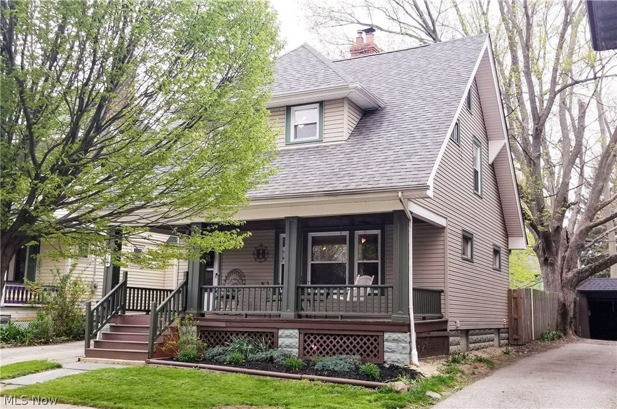 This beautiful, move-in ready colonial features 3 beds and 1.5 baths with a large inviting front porch.  Formal entry with original hardwood floors throughout main floor.  Formal dining room with built-ins.  Newer windows, roof, siding and updated full and half bath (2009).  Zoned heating and cooling.  Updated plumbing and electric.  Newer carpet installed in 2014, with original hardwood floors underneath.  Basement professionally waterproofed with transferable warranty.  Electric fireplace, plenty of storage, and great location.  10 minutes from downtown, Edgewater, and Lakewood Park.  Schedule your showing today.