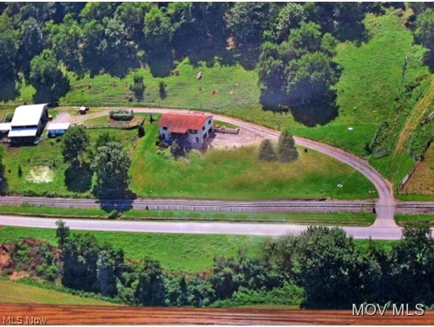 Tidy solid blt house in country setting. Large country kitchen has room for the family. Master BR is spacious with a large open closet. Laundry area and plenty of storage in basement. NON-OPERATING GAS WELL ON PROPERTY SO FREE GAS IS POSSIBLE. 2 French drains keep basement bone dry. Bath is large, measuring nearly 9x9. Half bath in basement is plumbed for a shower. Barn also has water & electric. Barn is 40x50. Two other outbuildings measure 20x10 and 18x8. *And has 3 gated stalls for livestock.  Elem: Harmar Elementary School  Elem/Bus: Y  JrHigh: Marietta Middle School School  JrHigh/Bus: Y  High: Marietta High School  High/Bus: Y  Fire: VOL  Police: SHF  ;SQFT=Fin L1:1400, Fin Above:1400, Fin Total:1400, Unfin Bsmt:1400, Unfin Above:1400;GAR= 2 Car Built In, Heated