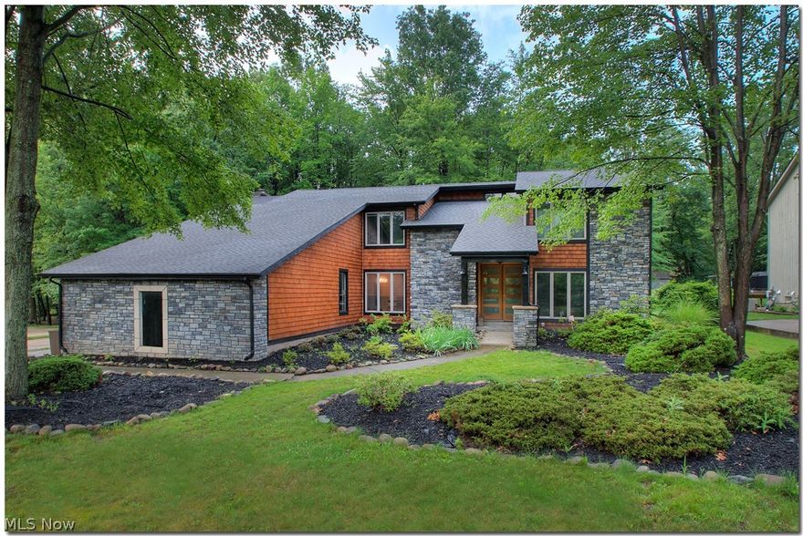 LOCATION LOCATION LOCATION!!! Welcome to your next beautiful new home! This amazing Brecksville home is located minutes from downtown! The newer cedar and stone siding takes your breath away! Most of this gorgeous home has been remodeled with updates of 2nd Master Bath (2017), Kitchen Remodel (2016), empire carpet 1st floor, 2nd Master, & 2nd floor hallway (2016), oak flooring in family room (2016), bamboo flooring in living room/game room (2015), Bamboo flooring in bedroom (2015), newer concrete patio slab (2015), tile flooring in mudroom (2015), tile flooring in half bath (2015), newer electrical panel (2015), and a beautiful newer custom fireplace (2014), Newer roof (2014).