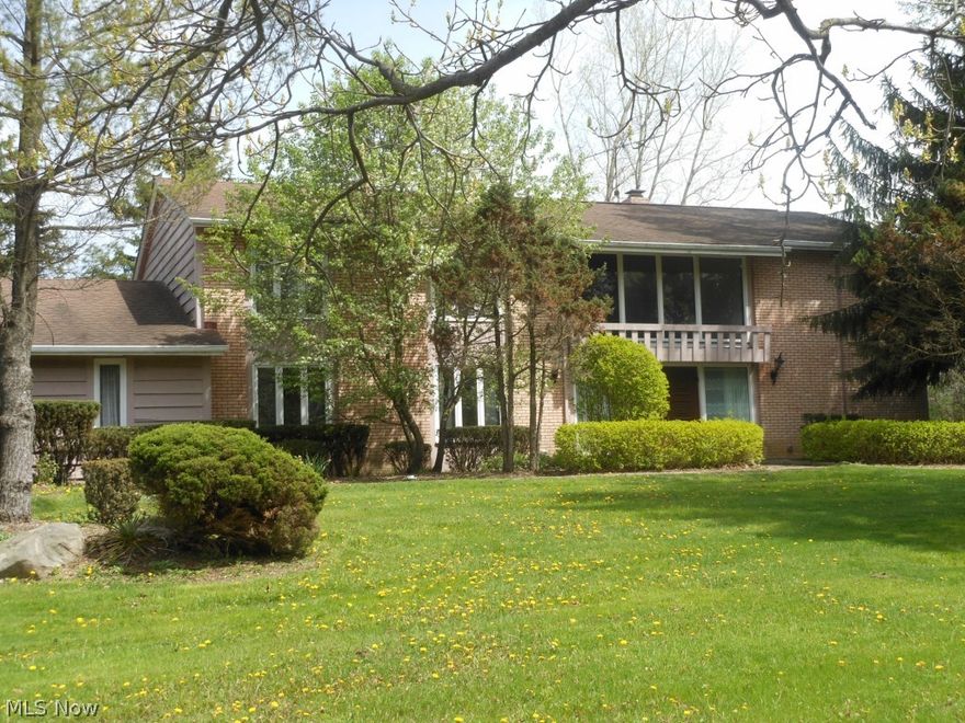 Spacious, updated home in Pepper Pike situated on an acre and a half! Dramatic 2 story foyer and family room. Updated gourmet kitchen, master suite with glamour bath, 1st floor library/den with full bath, finished rec room. Professionally landscaped.