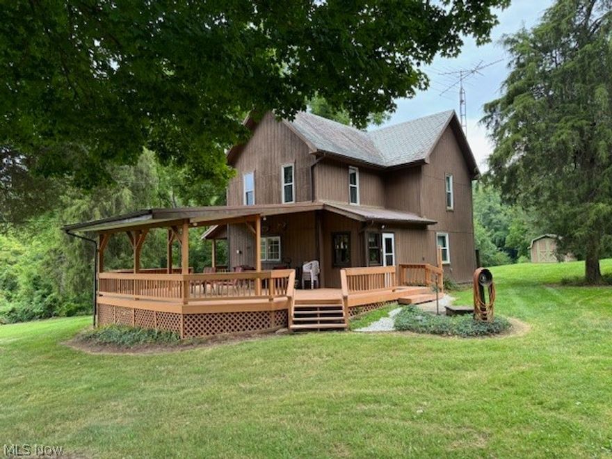 Looking for a deer hunter's retreat or private paradise? Want 300,000 cubic ft of FREE GAS? Look no further. Outside find 32 acres w/ woods, a spring, & a massive covered deck. The 3 car detached 32x40 garage w/ opener has a concrete floor & 2016 roof & siding. The 36x45 outbuilding w/ heated/cooled office, has water, electric & concrete floor w/ a 11.8 ft door & dog kennel. The insulated shooting shed has elec, heat & air, and is set up for target shooting w/ 100 & 200 yard targets. The farmhouse offers high ceilings, newer windows & doors, leaf filter gutters, an eat-in kitchen w/ appliances, a pantry w/ a stackable washer & dryer unit (washer/dryer hook up also avail in bsmt), & den/office that could be used as a first floor 4th BR. The upstairs has 3 large BR's. Most furnishings and contents of the home can remain if desired.