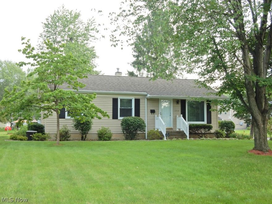 Darling 3 bedroom ranch with lots of updates. Beautifully updated kitchen with all appliances, 2 updated full bathrooms, stunning wood floors, newer roof, siding, windows, central air and garage door opener. Brand new hot water tank. Updated electrical service. Just move right in and enjoy the beautifully landscaped yard from your spacious deck or screened in patio. All situated on a large corner lot. Hurry! This one will go fast!