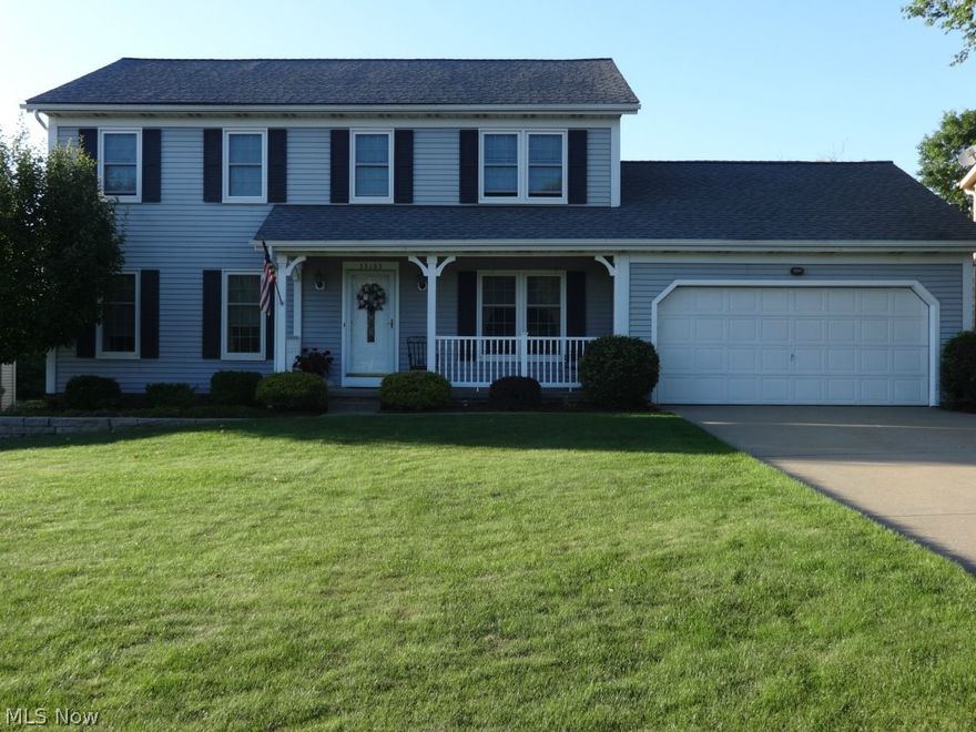 Rare find in Solon- Updated through-out! You can just move right in & enjoy all the upgrades! Start with the beautifully maintained yard & welcoming front porch. Inside you will love the open floor plan-formal dining room, formal living room, huge open eat-in kitchen with granite counter tops, stainless steel appliances, & island. Family room has wood burning fireplace-opens to the eat-in kitchen. Separate laundry room on 1st floor has laundry tub, cabinets, & window! 2nd floor features 4 bedrooms, including a master bedroom with gorgeous master bath (did I say gorgeous? - granite, 2 sinks, separate tub, oversized shower). Finished basement has office, recreation room, & plenty of storage. 2 car attached garage. Deck! Very quiet setting! Solon Schools. Liberty Hill development with community park nearby. Don't miss!