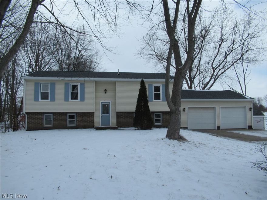 RECENTLY RENOVATED 3 OR 4 BEDROOM, 2 FULL BATH HOME IN NORTH CANTON.  This one has too many updates to list all and truly is a must see at this price!  New roof, kitchen, bathroom, windows, A/C, flooring, paint and more.  This open floor plan has a large eat-in kitchen w/a slider to the back deck w/fireplace.  Lower level is finished w/fireplace, full bath w/large jetted tub w/brick surround, and an office or 4th bedroom.  Two car attached garage.   Large open side yard w/storage shed.  Call for complete list of updates.  This one is truly a  must see and will make a great house to call home.