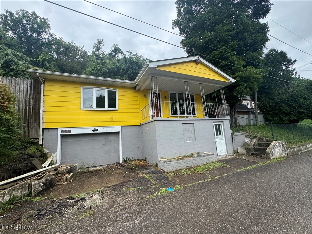Come see this ranch style home featuring 910 square feet of living space, two bedrooms and two full bathrooms. Step downstairs to find a one car garage, and a walkout basement. Outside you will find a paved patio and a fenced in yard.