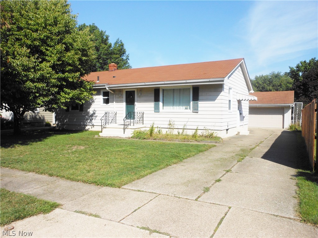 Estate. AS IS. Wood floors under carpet. Sun Porch. 2+car garage. Full basement - partially finished