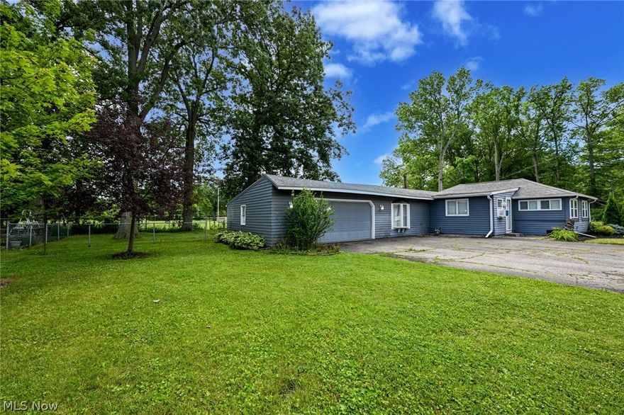 Experience of beautiful Lakeside Living in Vermilion, OH. This delightful 3 bedroom home is ideally situated just a stone's throw from Lake Erie and overlooks Showse Park, only steps away to Lake Erie access with views and tranquil surroundings. Recently updated, the house features a newer kitchen with sleek granite countertops and durable luxurious vinyl flooring throughout. Warm neutral tones create a welcoming ambiance, complemented by a modern stainless steel appliance package in the kitchen. A newer boiler heating system ensures comfort and efficiency making the home move-in ready. Plus, the property boasts an oversized garage, perfect for storing your jet skis and toys, along with an expansive fenced lot providing ample space to enjoy the outdoors and the picturesque scenery. Whether you're looking to buy a permanent residence or buy a vacation getaway, this property combines convenience with charm in one of Vermilion's most affordable sought-after locations. Schedule a showing today and envision buying yourself to enjoying the serenity and beauty of lakeside living.