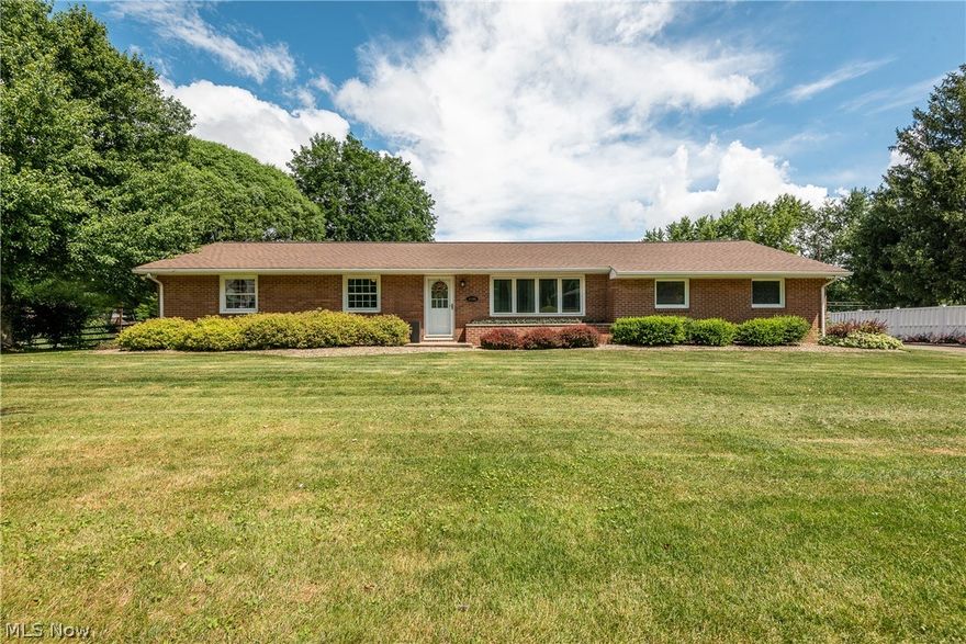 This fantastic ranch in the Jackson School District is a beautiful place to call home. Surrounded by mature landscaping the home has large front and backyard areas with exterior motion lights. There are outside solar lights around the fenced in backyard. Travelling into the front entrance you will find an open living room with a fireplace (which would need a gas insert to be functional) and gorgeous built-in cabinets with glass fronts. Head into the kitchen which is complete with newer stainless-steel appliances that convey, great cabinet space and an eat-in area with sliding doors to the back porch. New luxury vinyl flooring was installed this year throughout the living room, kitchen, bathroom, and hall. Move down the hallway and find the three bedrooms which feature the original hardwood flooring, closet organizers and windows that allow for ample natural lighting. The first-floor bathroom with a fantastic vanity, heated towel bars and cabinets was updated in 2019. The finished basem