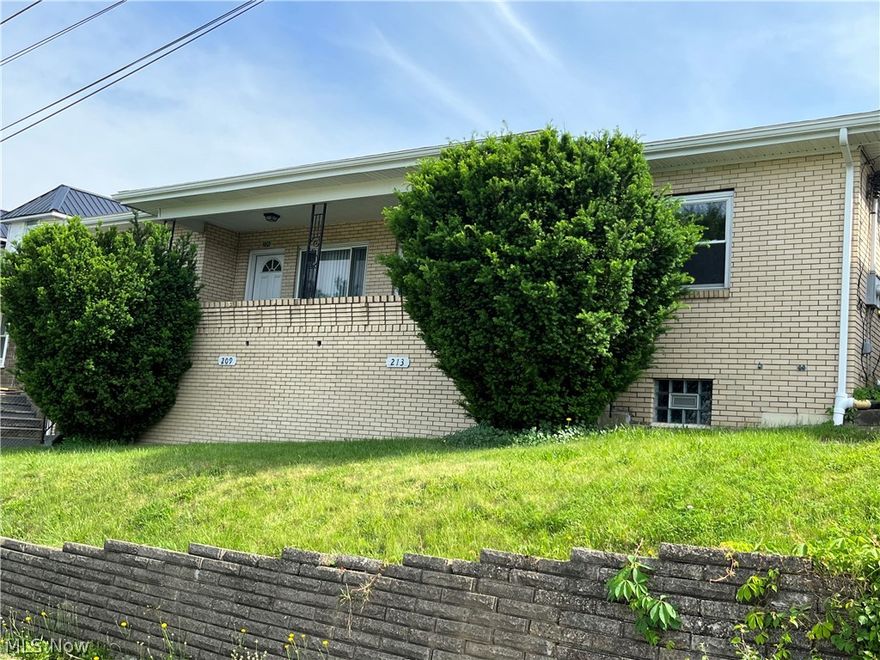 Brick Ranch duplex features 2 Two Bedroom units w/full basement.  Detached 2 car garage w/additional off street parking pad.