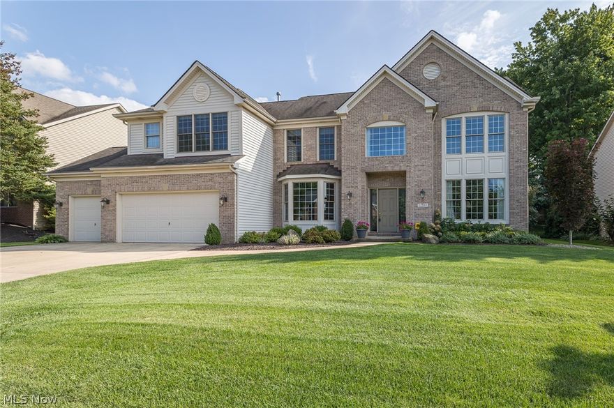 Beautifully appointed Colonial nestled in prestigious Westwood Farms! This move in ready home showcases attractive curb appeal, amazing backyard, oversized 3 car garage, 5,000+ sq.ft w/ desirable open layout, 4 bedrooms, 3.5 baths & finished basement! Welcoming 2 story foyer w/ lovely split staircase. French doors open to the private office w/ bay window, wood coffered ceiling & built-ins. Conjoined living room & dining room; perfect for formal gatherings. Tastefully updated eat-in kitchen complete w/ white cabinetry(42" uppers), granite counters, center island w/ seating, backsplash, pantry, dining area & included appliances(2018)! Vaulted sunroom w/ walls of windows. Gorgeous great room w/ cozy gas fireplace, 2nd staircase & wet bar. The laundry room & 1/2 bath complete the main level. The gracious split staircase takes you up to the vaulted owner's suite w/ sitting room, 2 walk-in closets & remodeled en-suite bath w/ custom tile shower, soaking tub & granite top double sink vanity.