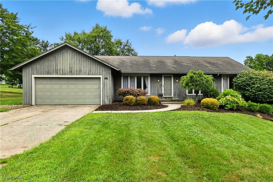 What a lovely ranch home with beautiful curb appeal in a gorgeous, park like setting! Enjoy the serenity of living in this well-appointed home that butts against a large, manicured field making it feel like it is in the country. The spacious, upgraded granite kitchen features a new fridge and dishwasher, walk-in pantry and has an optional butcher block cover designed to be removable - it fits right over the granite top! Your favorite chef will love it. The walkout basement is finished with a rec room, half bath, fourth bedroom and office, and is included in the square footage of the home.  With new ac and furnace in 2024, and an HOA that is just $100 per year that takes care of plowing sidewalks and mowing the field behind the house, you can't go wrong. The two decks out back make this a wonderful place to host friends and family. Call today to see this lovely home!