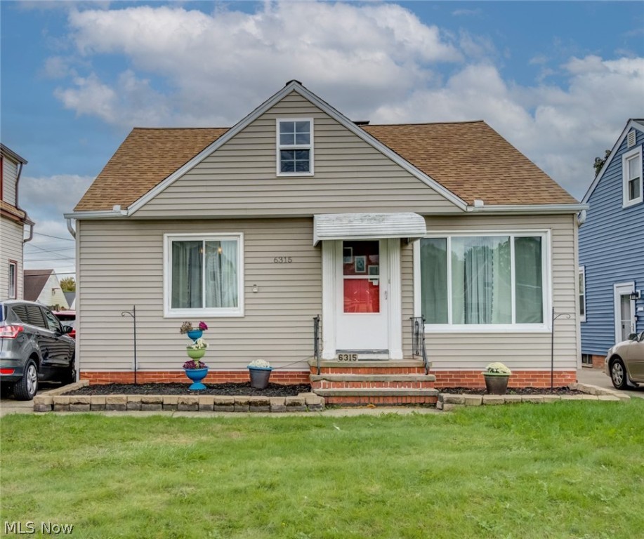 This spacious Parma bungalow is ready for you! The entire interior has been freshly painted and note the large room sizes on first floor. There is a formal dining room with charming built in corner cabinets, a well-equipped kitchen with all appliances to stay, plus two bedrooms on the main level – one with a walkout to the backyard’s covered porch. Walk up to the second floor to a spacious master bedroom with walk-in closet. The basement features a gaming room, play room, storage area and utility room plus a half bath. Roof replaced in 2015 (complete tear off) and fully fenced backyard with firepit for your outdoor fun. Welcome Home!