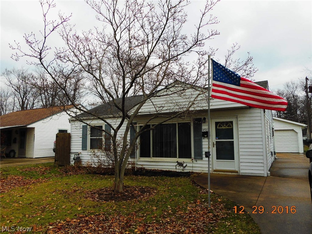 Starting out or starting over? 3 bedroom ranch with 2 car detached garage has good curb appeal and nice yard for play or garden! Why rent when you can enjoy affordable, low maintenance, one floor living? Carpeting in living room and bedrooms installed late 2016. There’s a combination laundry and kitchen for ease in doing chores. There’s a partially fenced yard, concrete drive and vinyl siding. All appliances remain and seller is offering a one year home warranty with HMS for 489.00 which now includes a homeowners insurance deductible reimbursement and emergency lodging reimbursement! Great location is close to freeway, neighborhood playground and pool.