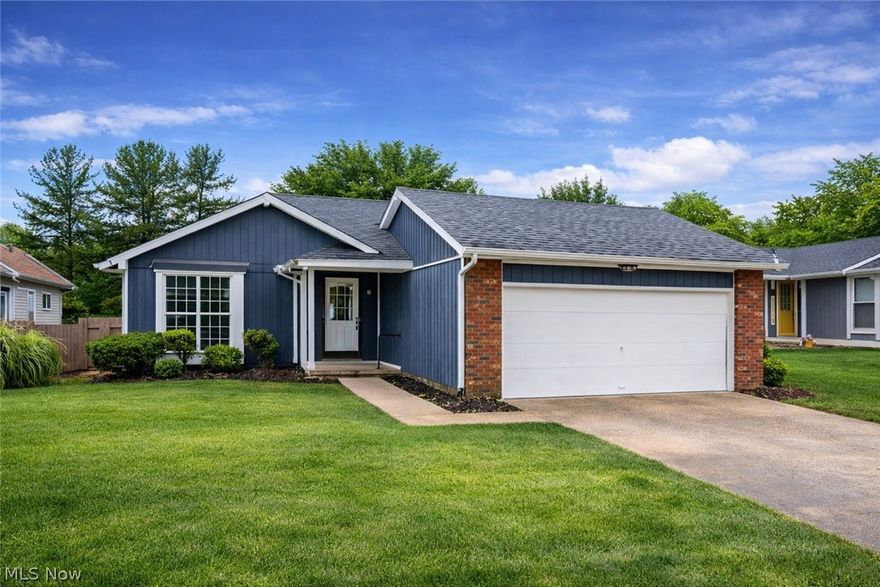 Experience refined modern living in this beautifully updated residence on Zanesville’s desirable north end. Thoughtfully redesigned with a sophisticated aesthetic, this home offers three spacious bedrooms and two beautifully updated full baths, including a serene primary suite with its own private bath. The newly renovated kitchen is a true showpiece, featuring striking granite and butcher block countertops, brand-new appliances, and a well-appointed pantry—perfect for both everyday cooking and elevated entertaining.

An airy open-concept layout flows effortlessly into the vaulted living room, where natural light and generous volume create an inviting sense of luxury. Fresh interior and exterior paint, new flooring throughout, and a brand-new roof—complete with new gutters, new downspouts, and new flashing—provide exceptional peace of mind.

Step outside to a sprawling back deck overlooking a fenced backyard, ideal for gatherings, relaxation, or play. The attached two-car garage adds convenience, while the full walk-out unfinished basement offers endless potential for future expansion. Perfectly positioned near shopping, dining, and everyday amenities, this beautifully updated home is available for immediate possession. Simply unpack and begin enjoying the elevated lifestyle it offers.