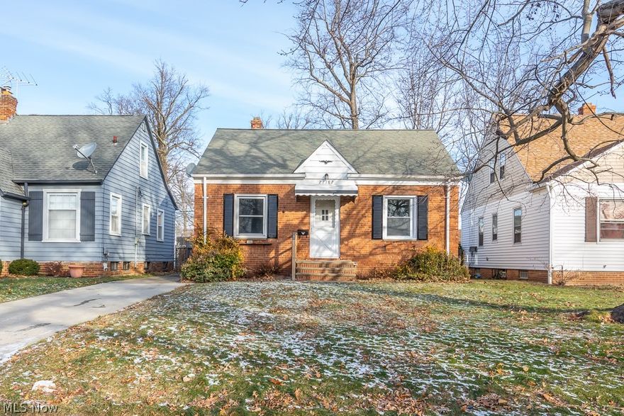 Lovely well maintained brick cape cod home with lovely three season room on rear or the home looking out on the fenced in yard! Freshly painted in neutral color. All newer replacement windows. Newer flooring and ready to move in. Large Mstr bedroom up and two bedrooms on first level! Close to schools, shopping and transportation!