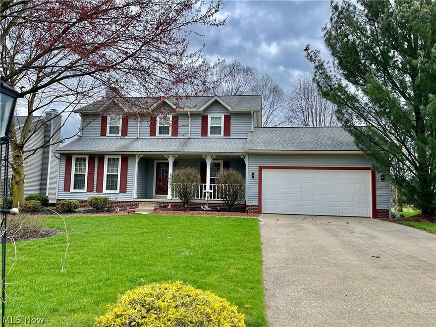 Classic Wagner Colonial shows pride of ownership for the past 26 years.  Covered front porch welcomes you as you enter the foyer with hardwood floors.  Formal Dining room with crown Moulding along with formal living room hugs the foyer, and heading straight back into the kitchen you will find an additional dinette space nestled between the kitchen and family room.   The bay window in kitchen overlooks the common area and green space.  Plenty of cabinet and counterspace for the chef within.  Stainless steel refrigerator, stove, & dishwasher stay, along with washer & dryer. Large deck accessible through sliders off kitchen.  Half bath and laundry area complete the first level.  Three spacious bedrooms make up the second level along with 2 full baths.  The master suite offers a vaulted ceiling with plant shelf, private bath with skylight & walk in closet.  The second full bath serves bedrooms two and three.  Lower level offers a finished rec room with more space for fun, utility & storage area, workshop and crawl space .  Backyard screams "summer fun" with a large deck, wrap around stamped concrete patio & walkway, including a firepit, all with access to the green space for outdoor games.  Need to get away for a bit? Head to one of the many Eaton Estate amenities, from outdoor pool, tennis courts, playground, or walking trails.  Updates include windows 2016, roof 2009, bathroom floors & fixtures 2017, HVAC.  Conveniently located between CLE & AKR, just minutes from shops & dining, Cuy Valley Nat'l Park, Metroparks, Boston Mills & Brandywine ski resorts.  Nordonia Schools .