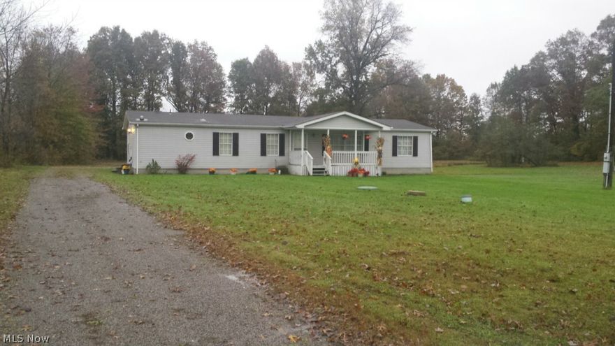 Beautiful 3 bedroom, 2 bath home located on 1.6 acres.  Excellent location for someone commuting to Cleveland/Middlefield areas.  This home features a large living room, formal dining area leading to an open kitchen with breakfast bar.  A separate breakfast nook off of the family room overlooks large deck w/gazebo . SELLER IS MOTIVATED.