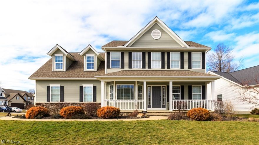 Once you step into this classic  4 bedroom colonial you'll be please with the many upgraded features through out.  Light flows through out this first floor because of the many transom windows over door ways and windows.  Hardwood floors in the foyer and half bath are one of the many features that will surprise you.  Great room features a stone accented gas fireplace and opens in the eat in kitchen with breakfast bar, bow window, ceramic backsplash, and under cabinet lighting.  Formal dining room features a bow window and wainscoting for the classic look.  Escape to the full finished basement with a fabulous family room featuring a electric fireplace, bar and half bath.  Study offers a quiet space to do homework or read and is one of the owners favorite rooms.  The master suite is just what your looking for with a vaulted ceiling and spacious master bath with a granite counter top and soaking tub.  The bonus 4th bedroom has a build in cabinet that is perfect for game and toy storage.  T