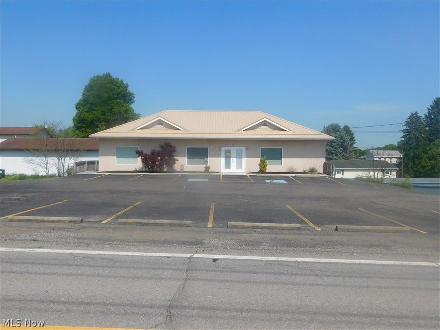 Office building located in a high traffic area with plenty of parking. Currently upstairs rented as a Doctors office with additional rental downstairs.