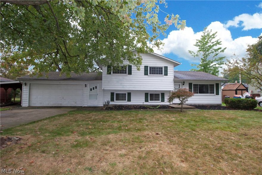 Great 3 bed  split level home with a 2 1/2 car garage a in convenient location.  Close to schools, Lake Erie, beaches, shopping and quick access to Route 2.  This house is a must see.  It defines move-in ready.   Freshly painted with lots of updates and upgrades.  Stainless steel appliances in the kitchen.  Granite counter tops in the redecorated upstairs full bath.  Large family room with gas/wood burning fireplace on lower level.  Sunroom off of kitchen in the back of the house has a ventless fireplace.  Large deck perfect for entertaining overlooks the spacious backyard complete with large shed.  See this before it is gone!