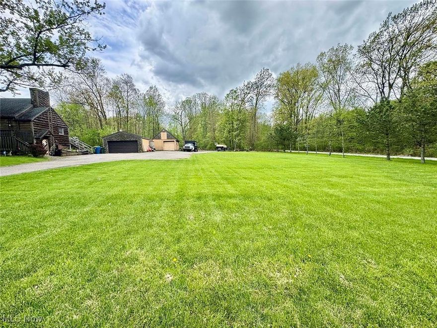 Great opportunity to own 7 acres of land, zoned B-3. Great location with heavy traffic count right on Rt 619 midway between Arlington Rd and Massillon Rd. Loads of possibilities. Call zoning for your particular needs. Water and sewer are at the street. There is a nice four-bedroom home at the front that is currently being used as a residence. Ideal conversion for an office or a business location.